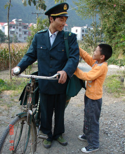 Zhong Yiang, a fourth-grader, on a trip with his father delivering letters in a small mountain town in China.