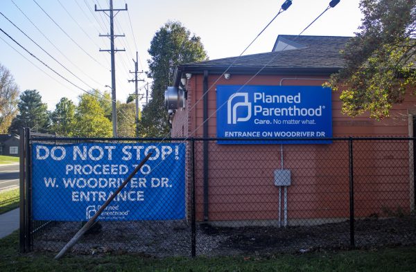 A sign warns patients to not stop before the entrance at Planned Parenthood in Carbondale, Illinois. “We’ve had patients complain of protesters standing really close to the driveway with traffic vests (and) clipboards attempting to get information from them, and usually they’ll try to do it in a deceitful manner,” said Patience Roundtree, director of advocacy and organizing at Planned Parenthood of Illinois. “They’ll pretend to be part of our staff, and then they’ll try to reroute them to those CPCs, their crisis pregnancy centers.”